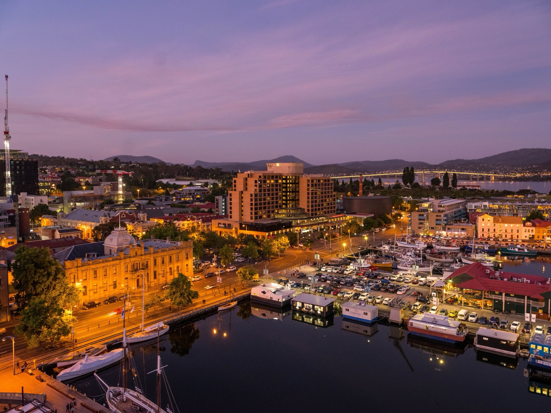 Hobart waterfront lit up at night across the harbour