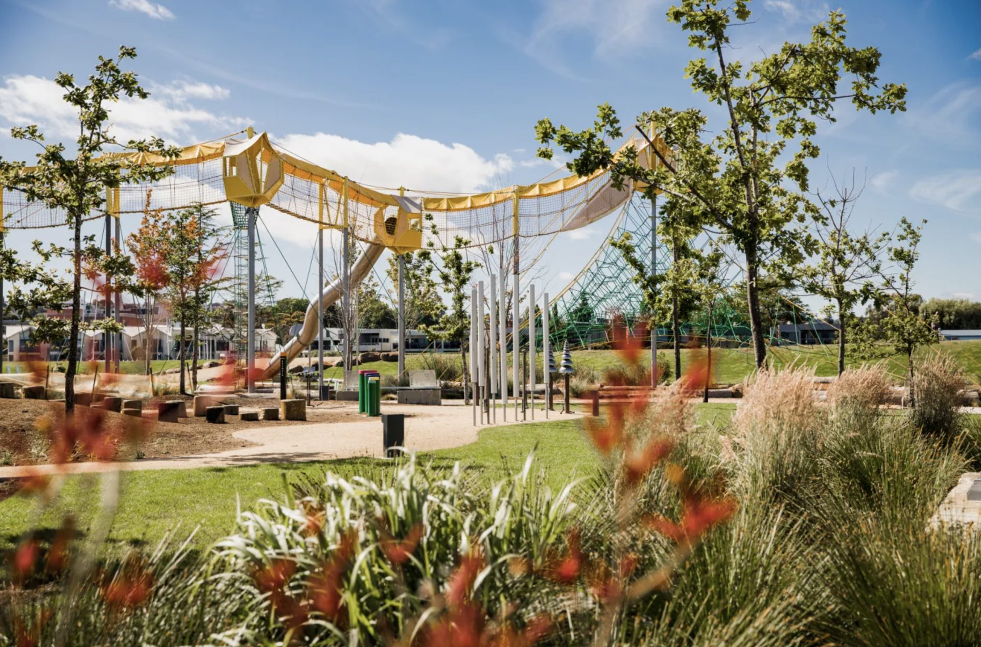 Riverbend Park playground in Launceston, with a yellow-canopied sky walk and climbing net